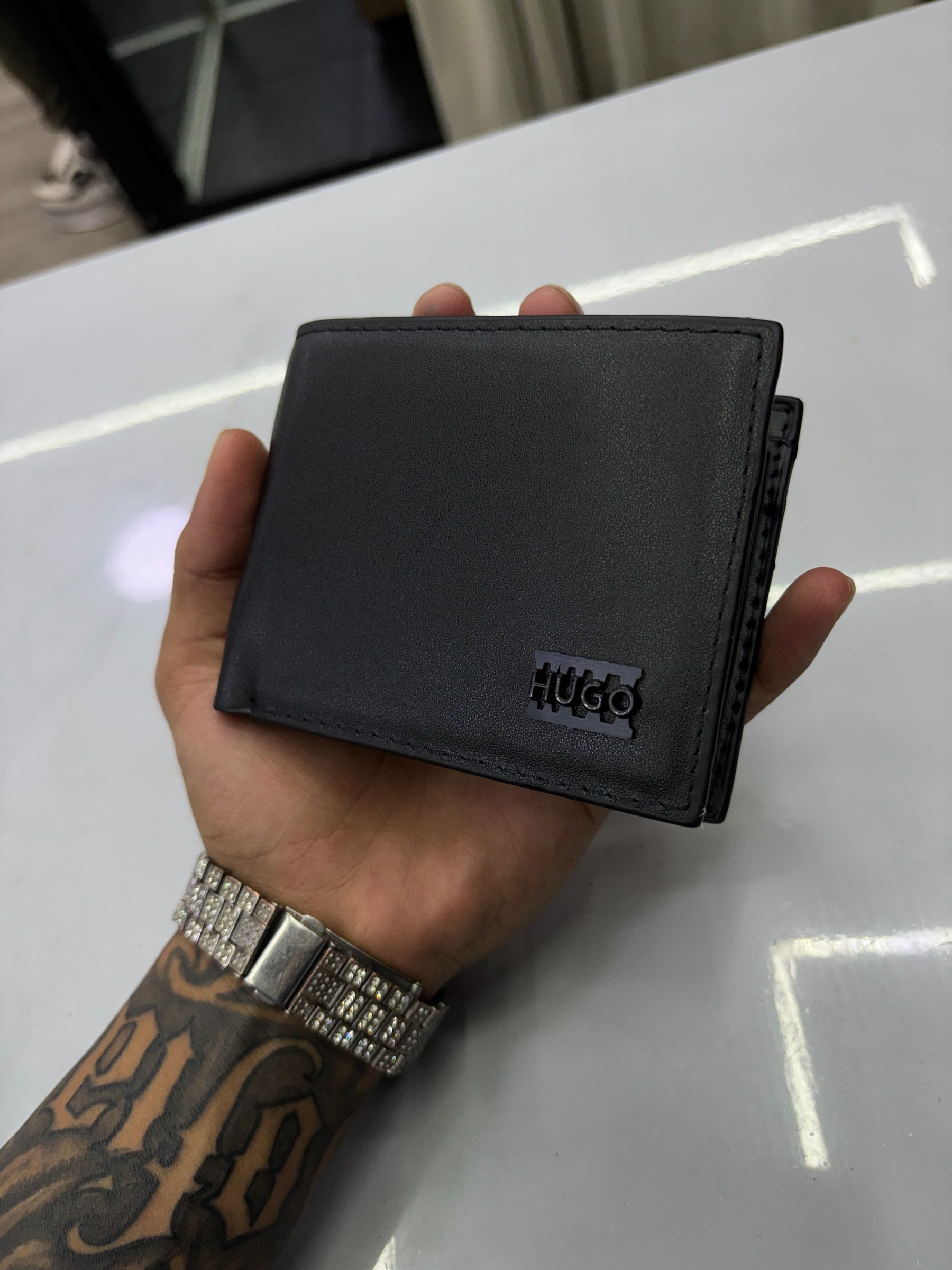 Billetera Hugo